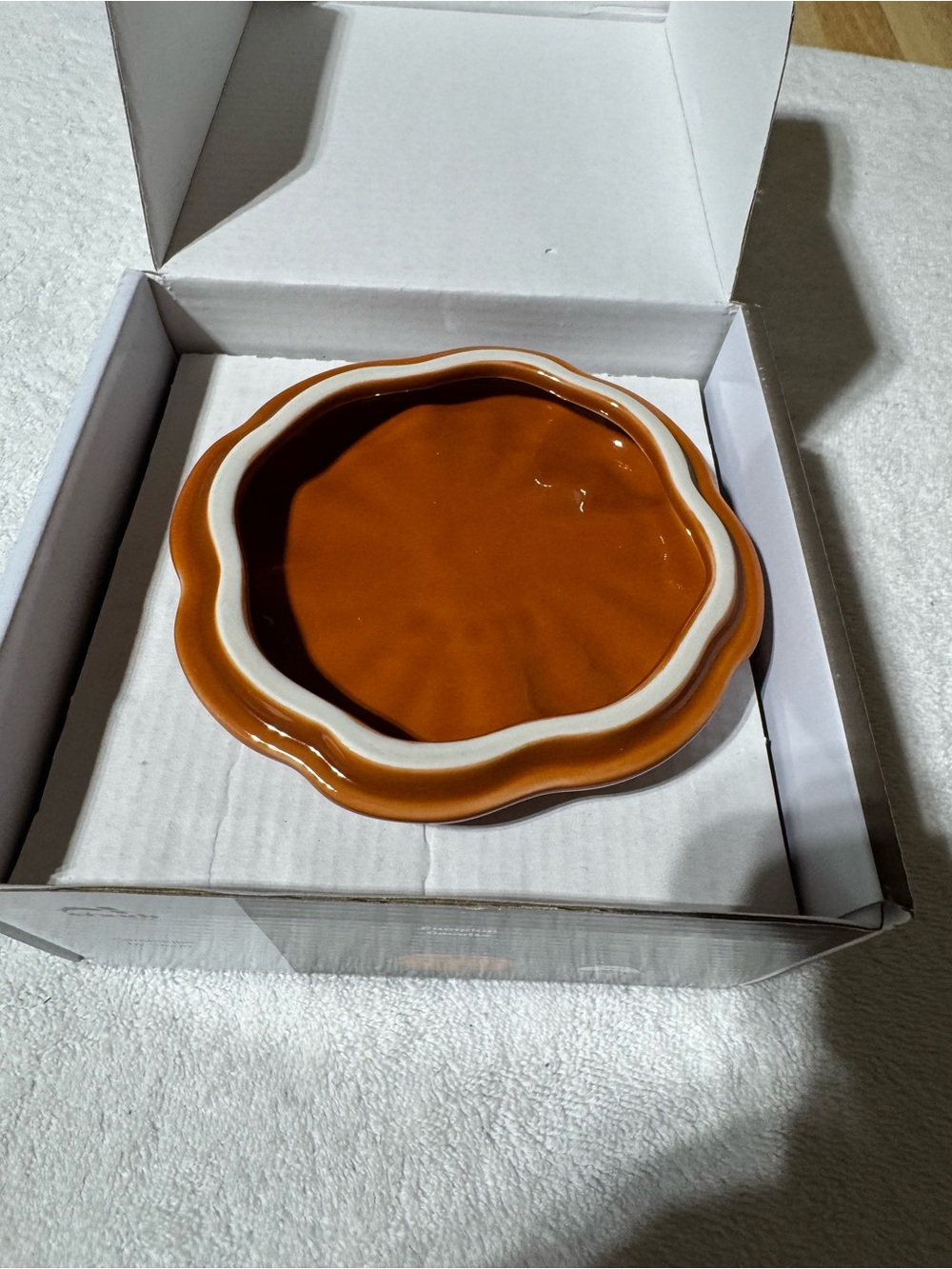 Staub Pumpkin Cocotte in Deep Orange with Bronze Stem - Picture 3 of 5